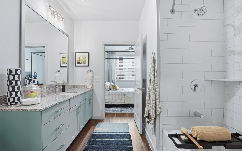 Prose Greenbriar spa-inspired bathrooms connected to primary bedroom