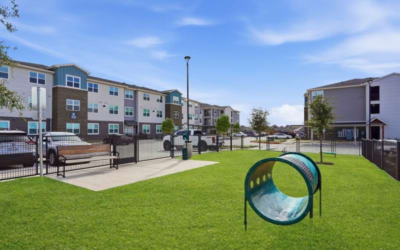 Fenced-in dog park at Prose Greenbriar apartment community